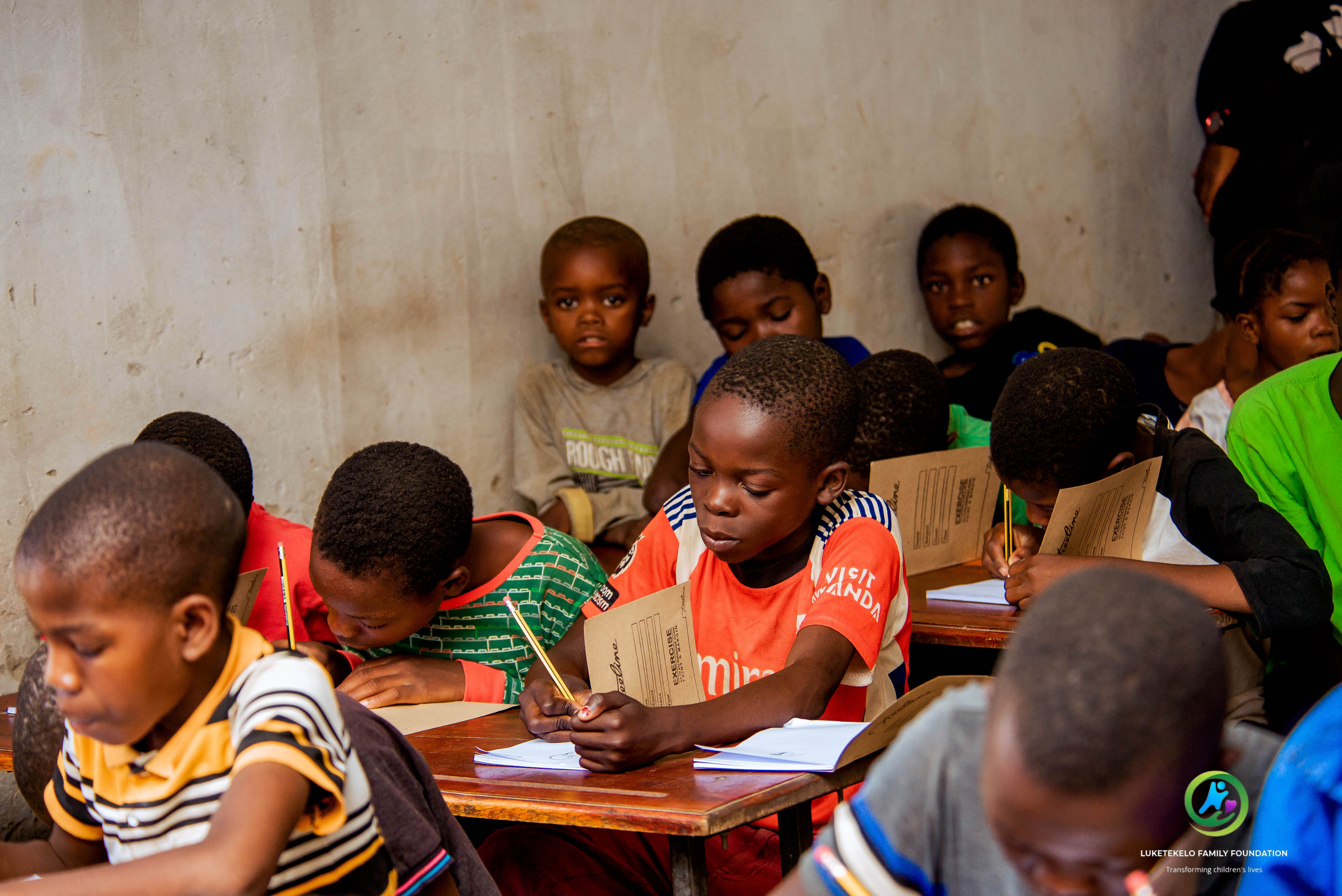 Children participating in Faith Family Foundation activities, playing joyfully outdoors
