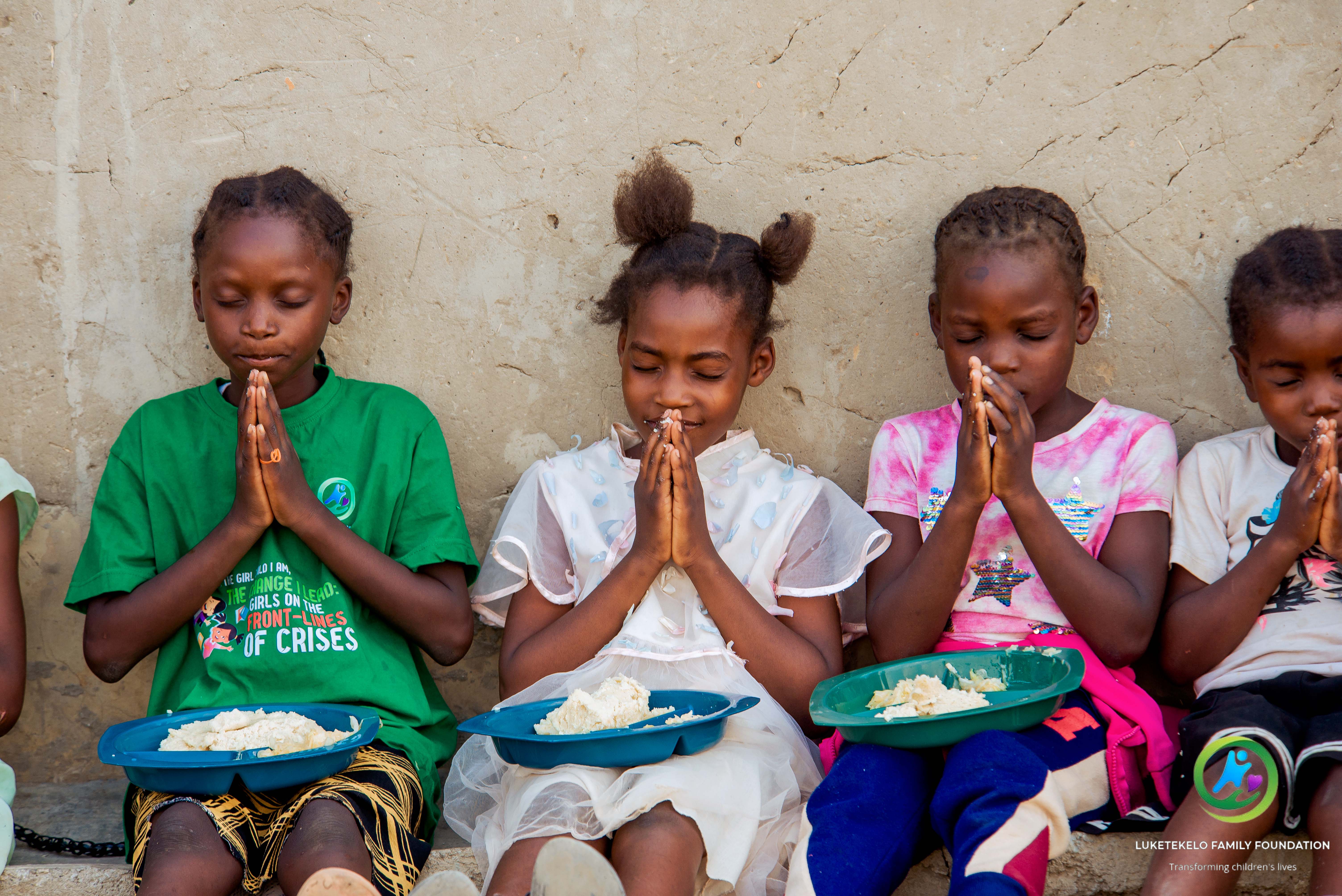 Children and community members participating in Faith Family Foundation educational programs
